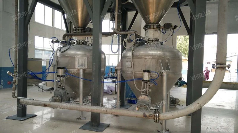 Pneumatic conveying of sheet-like granular materials